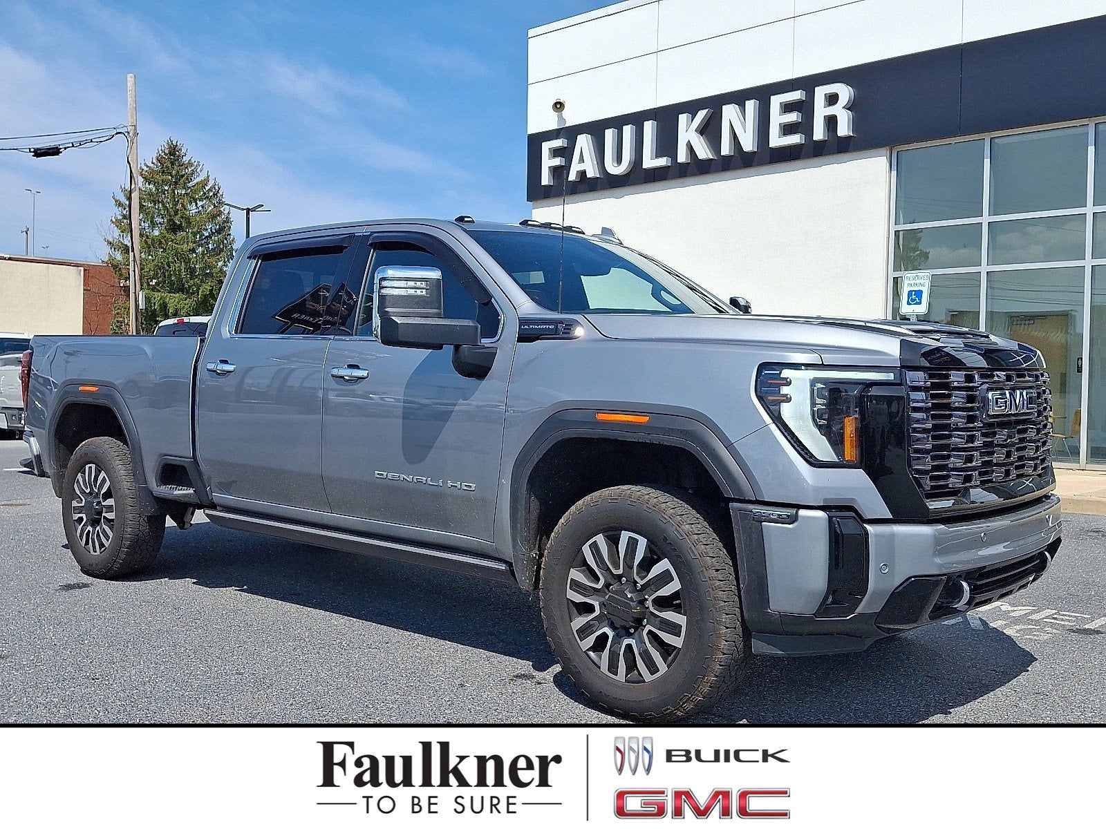 2025 GMC Sierra 2500 HD Denali Ultimate in Sterling Metallic — front three-quarter view