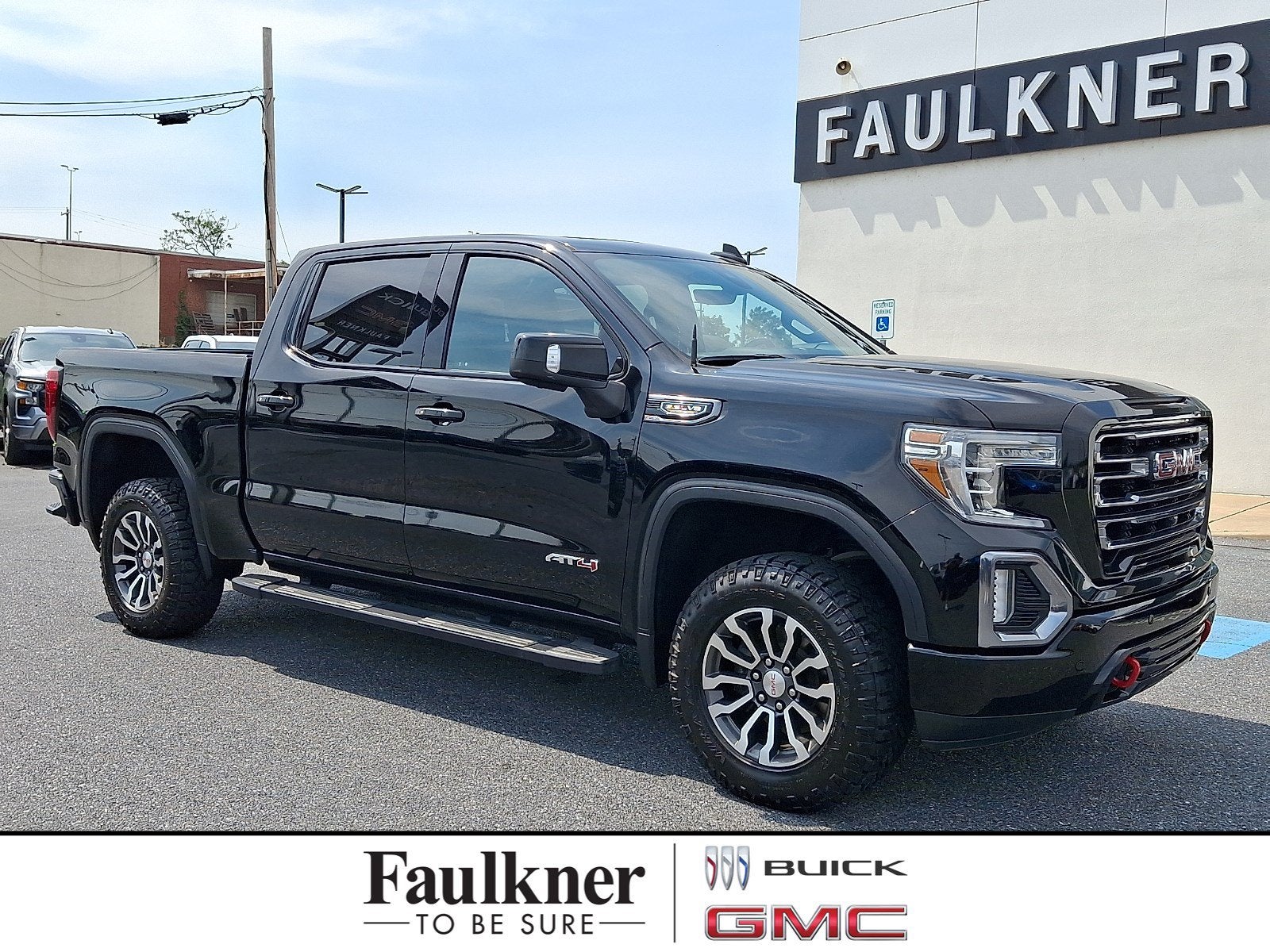 2020 GMC Sierra 1500 AT4 in Onyx Black — front three-quarter view