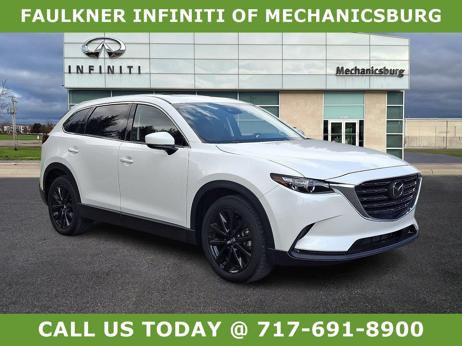 2023 Mazda Mazda CX-9 Touring Plus AWD in Snowflake White Pearl Mica — front three-quarter view
