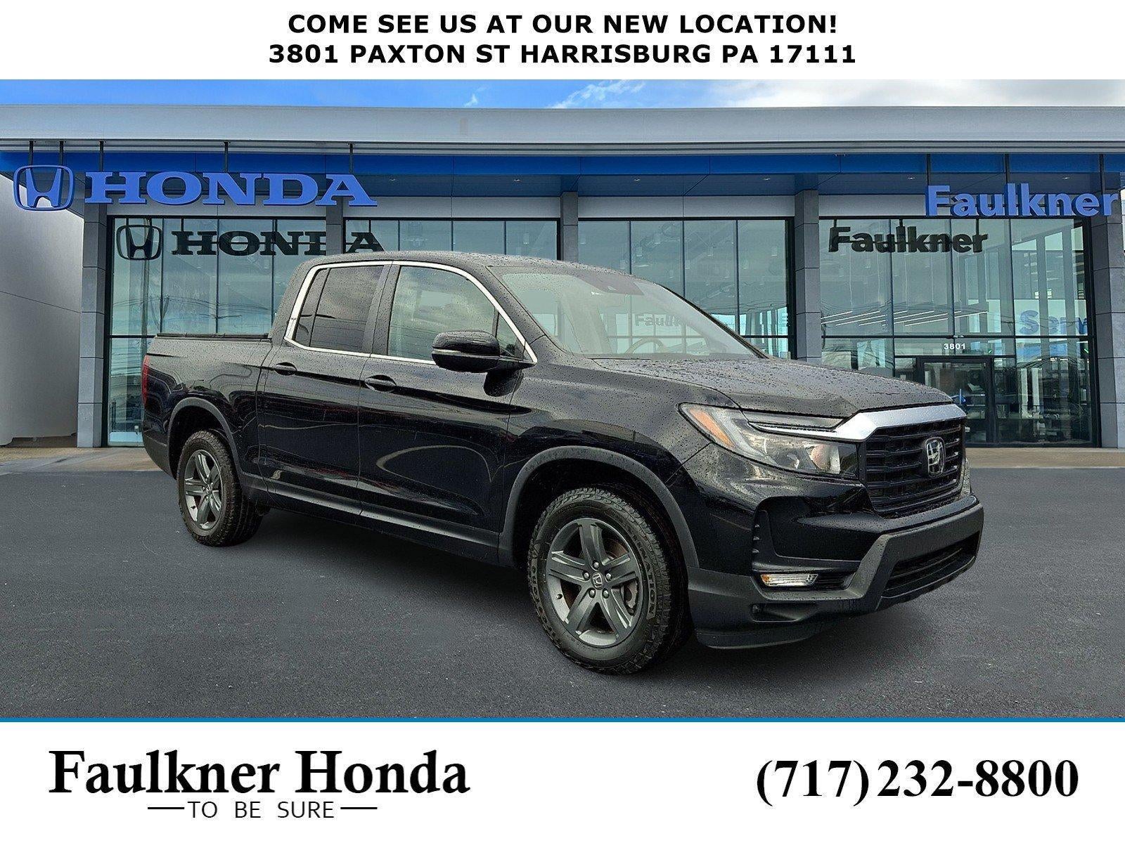 2023 Honda Ridgeline RTL AWD in Crystal Black Pearl — front three-quarter view