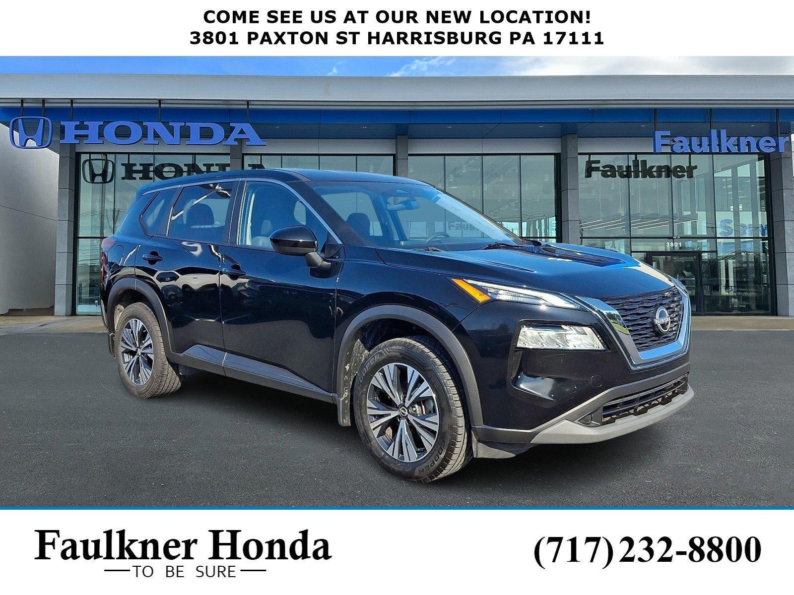 2023 Nissan Rogue AWD SV in Super Black — front three-quarter view