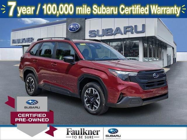 2025 Subaru Forester AWD in Crimson Red Pearl — front three-quarter view