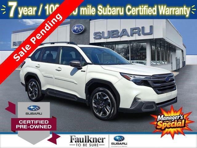 2025 Subaru Forester Limited Hybrid AWD in Crystal White Pearl — front three-quarter view