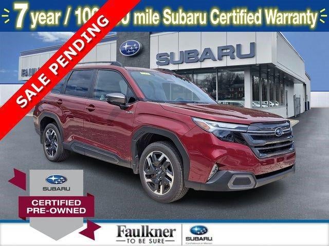 2025 Subaru Forester Limited Hybrid AWD in Crimson Red Pearl — front three-quarter view