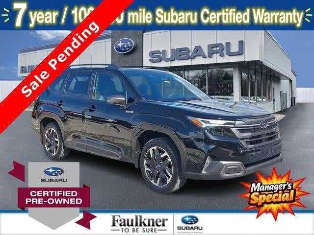 2025 Subaru Forester Limited Hybrid AWD in Crystal Black Silica — front three-quarter view