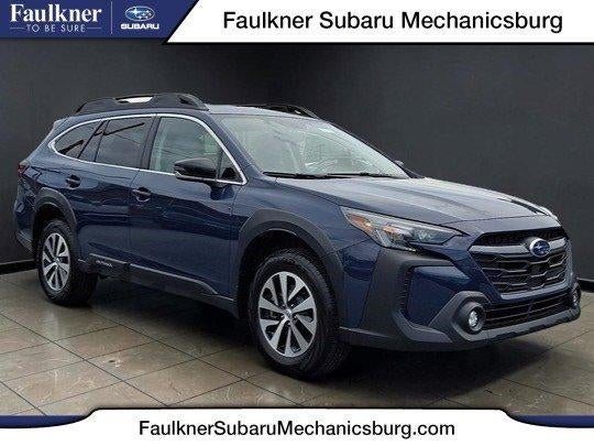 2025 Subaru Outback Premium AWD in Cosmic Blue Pearl — front three-quarter view