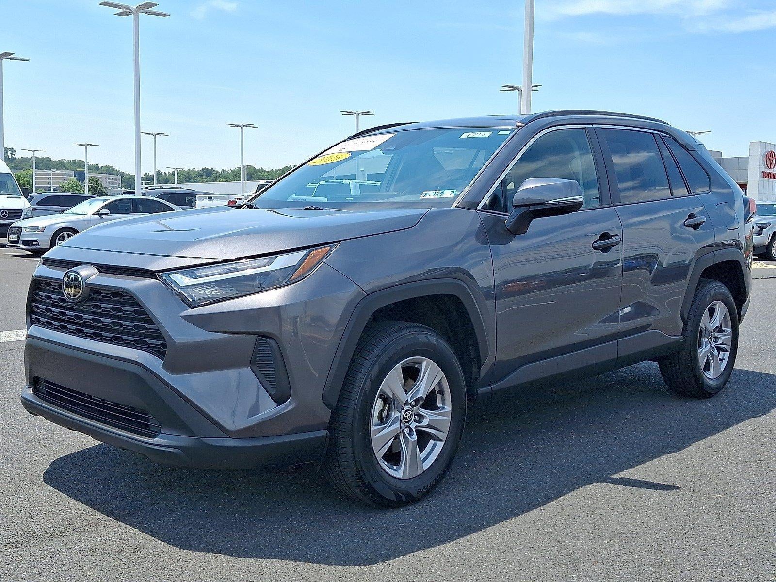 2025 Toyota RAV4 — rear three-quarter view