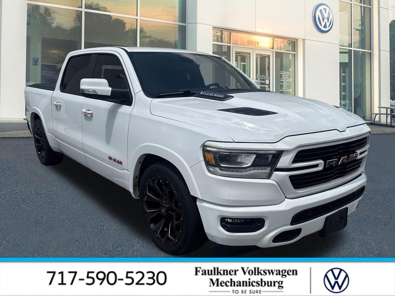 2021 RAM 1500 Laramie 4x2 Crew Cab 5'7" Box in Bright White Clearcoat — front three-quarter view