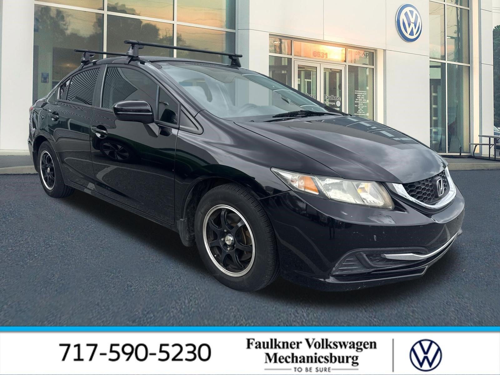 2015 Honda Civic Sedan LX CVT in Crystal Black Pearl — front three-quarter view