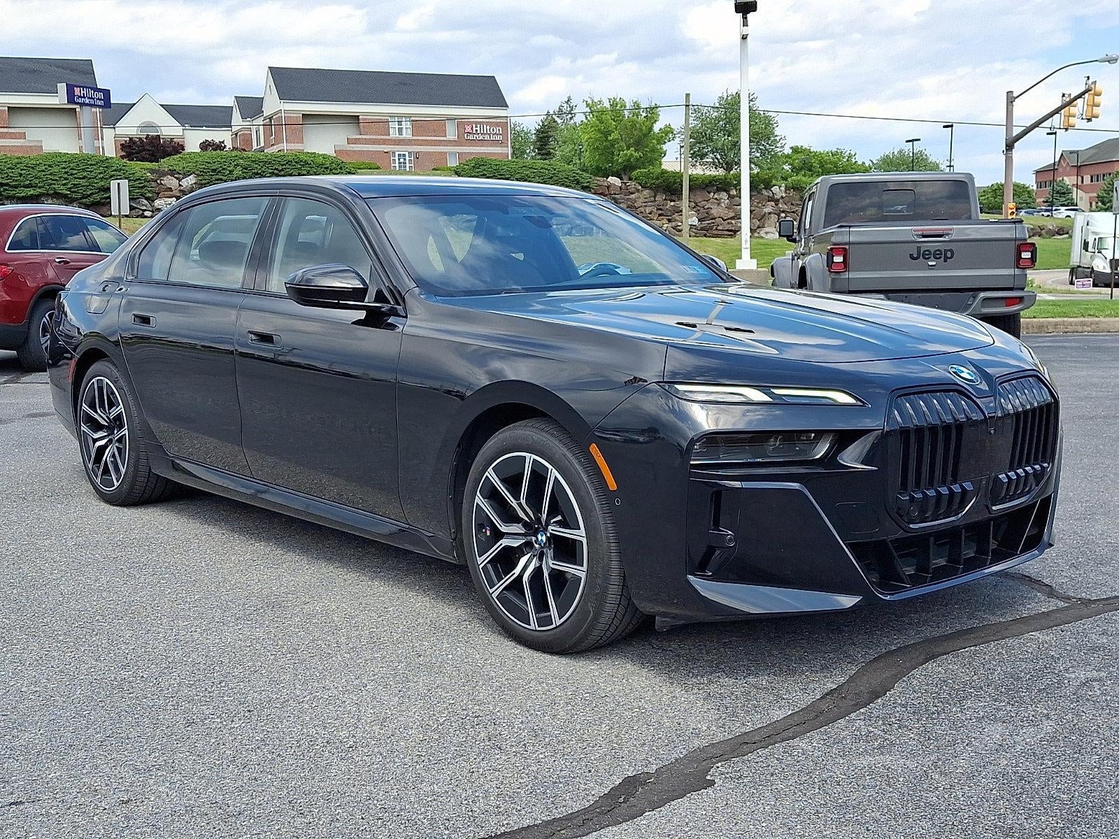 2023 BMW 760i xDrive Sedan in Black Sapphire Metallic — front three-quarter view