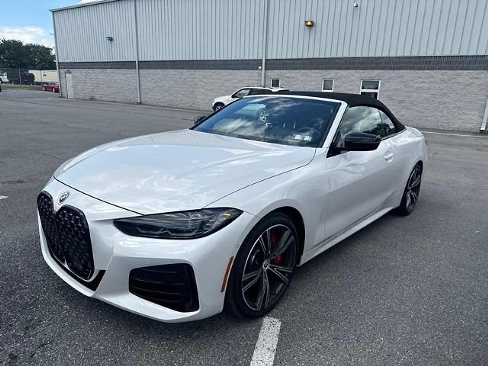 2023 BMW M440i xDrive Convertible in Mineral White Metallic — front three-quarter view