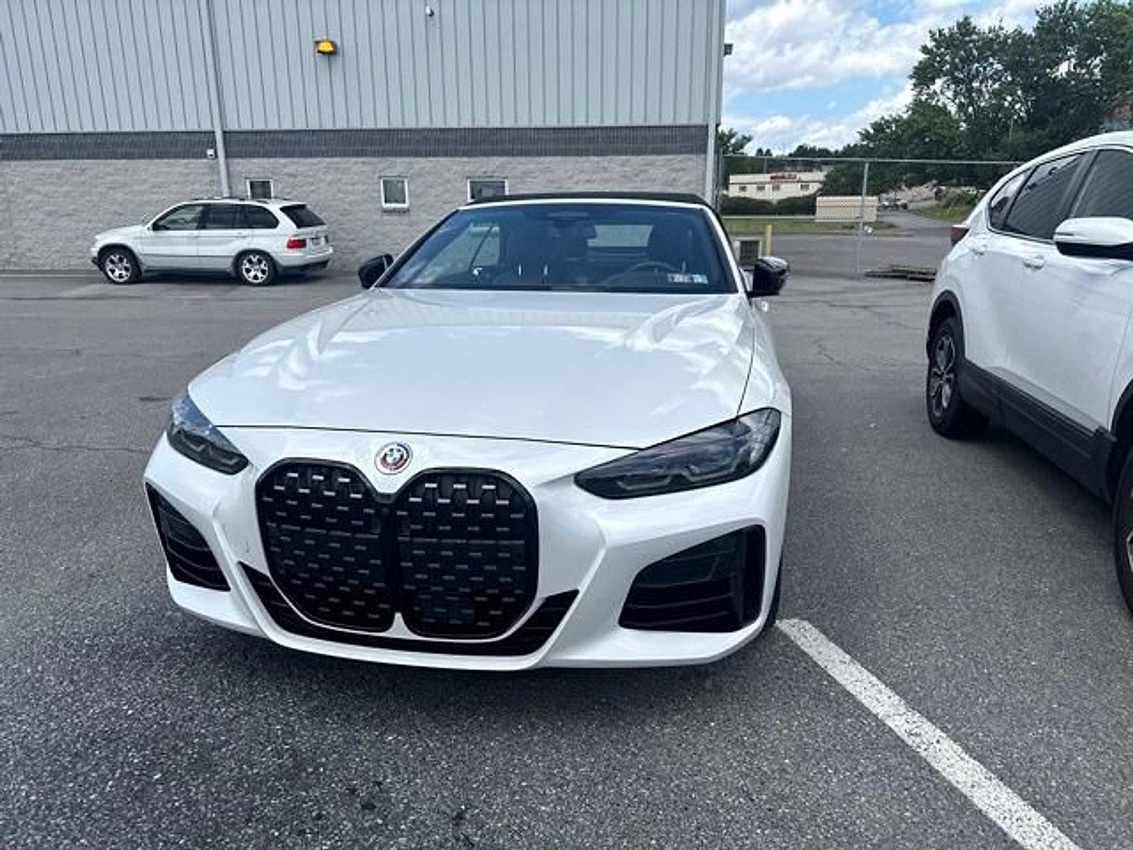 2023 BMW M440i xDrive — side profile view
