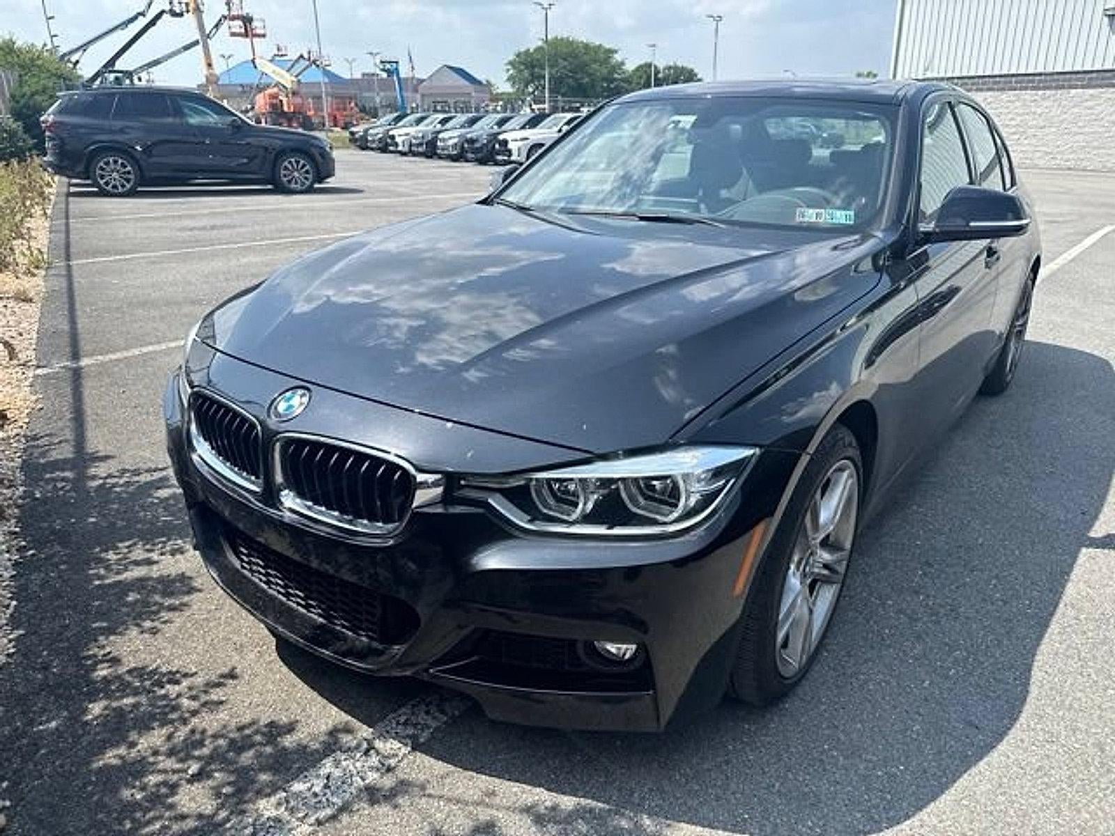 2016 BMW 328i xDrive Sedan in Black Sapphire Metallic — front three-quarter view
