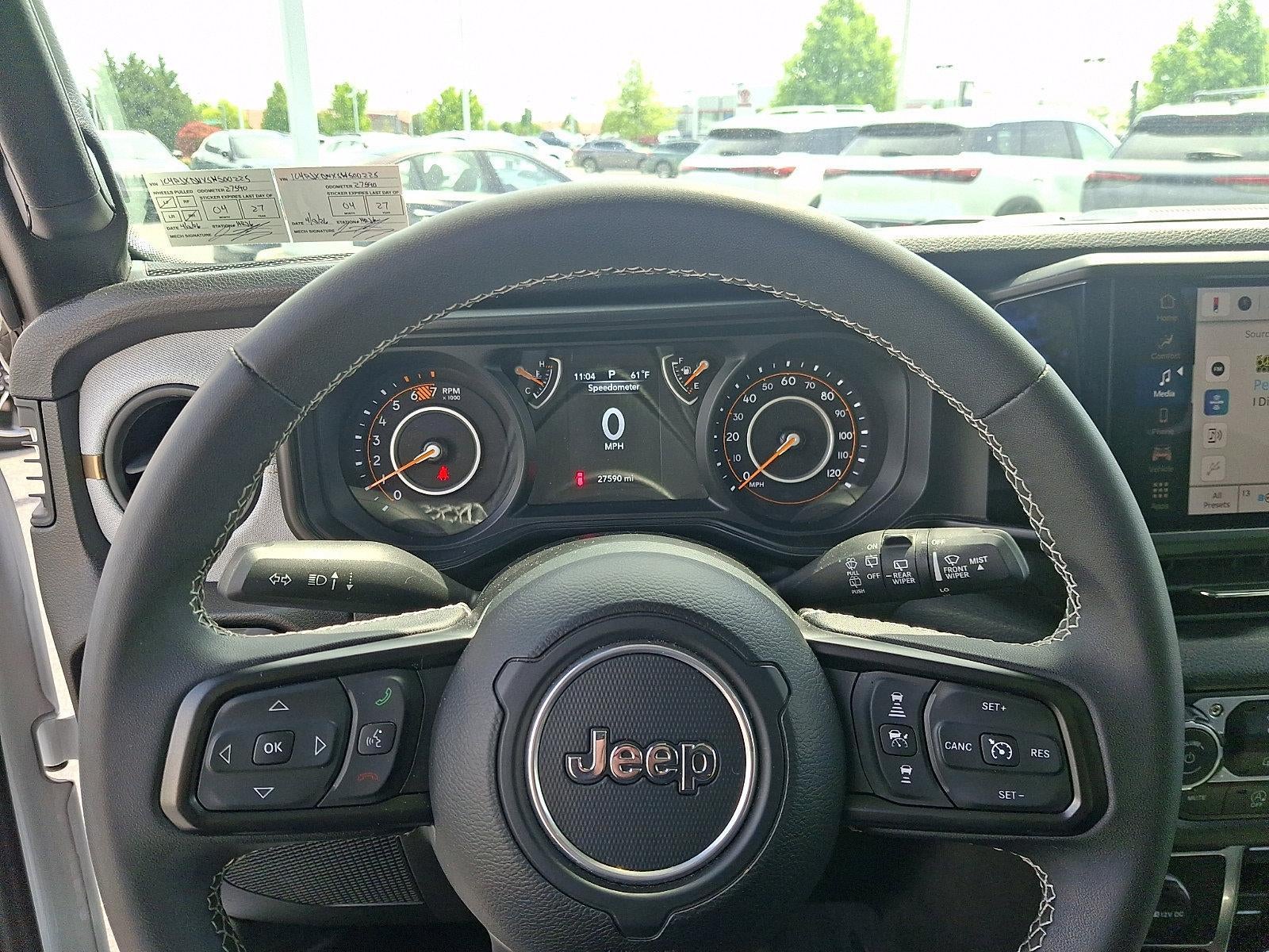 2025 Jeep Wrangler — rear three-quarter view