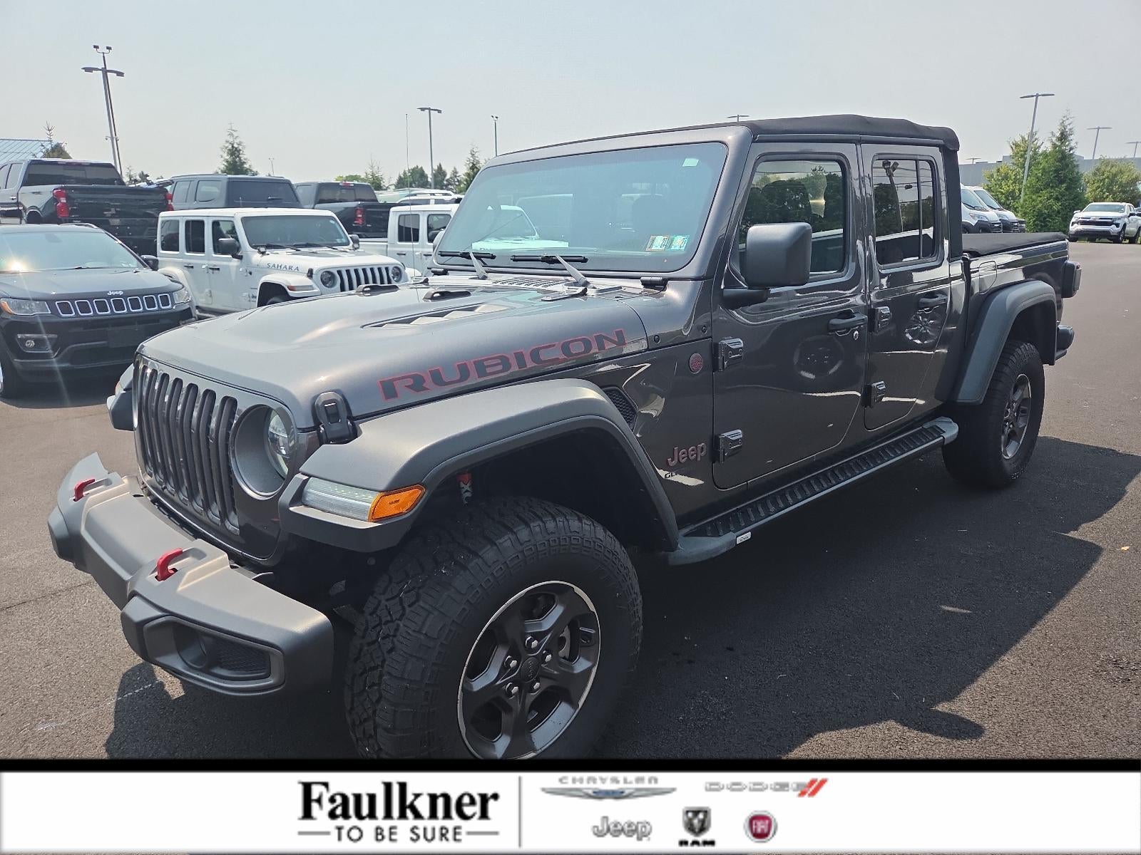 2020 Jeep Gladiator Rubicon 4x4 in Granite Crystal Metallic Clearcoat — front three-quarter view