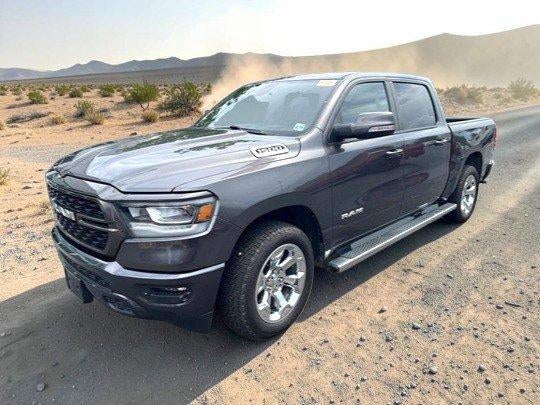 2022 RAM 1500 Big Horn 4x4 Crew Cab 5'7" Box in Granite Crystal Metallic Clearcoat — front three-quarter view