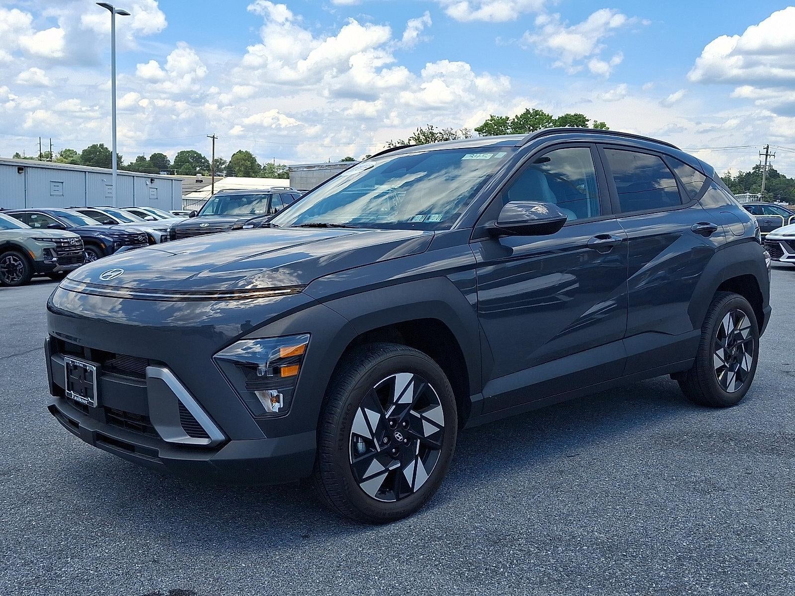 2024 Hyundai KONA SEL in Ecotronic Gray Pearl — front three-quarter view